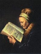 Portrait of an old woman reading Gerrit Dou